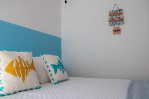 Postel nebo postele na pokoji v ubytování H El Palmeral Playa