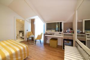 A bed or beds in a room at Icon Hotel Taksim