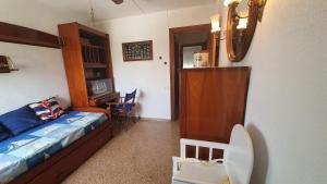 Łóżko lub łóżka w pokoju w obiekcie Apartamento en primera linea en la Playa de San Juan
