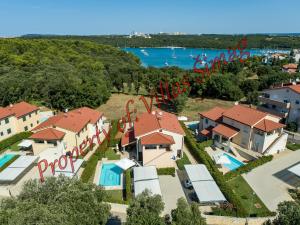 an aerial view of a villa with a resort at Villas Simag in Banjole