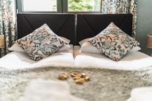 Posteľ alebo postele v izbe v ubytovaní Apartamenty Jedlina