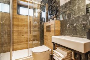 Kúpeľňa v ubytovaní Apartamenty Jedlina