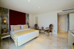 A bed or beds in a room at Icon Hotel Taksim