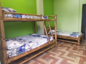 Postel nebo postele na pokoji v ubytování Casa de Flores