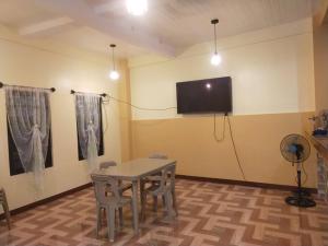 TV a/nebo společenská místnost v ubytování Casa de Flores