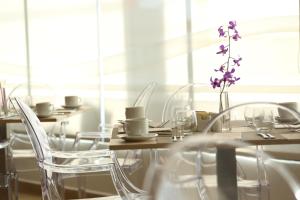 Majoituspaikan Aranjuez Hotel & Suites ravintola tai vastaava paikka