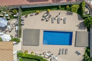 Bazén v ubytování Iberflat Villa Los Pinos nebo v jeho okolí