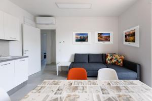 Χώρος καθιστικού στο Verona Suites