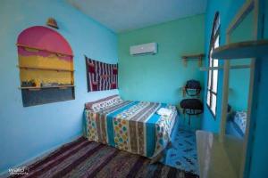 Postel nebo postele na pokoji v ubytování Rayan's Beach Camp + 19 fotografií