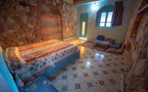 Postel nebo postele na pokoji v ubytování Rayan's Beach Camp