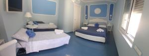 Postel nebo postele na pokoji v ubytování B&B Domus Anfra
