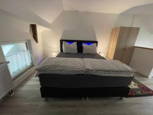 Postel nebo postele na pokoji v ubytování Ferienwohnung Einstein