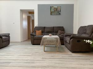 Posezení v ubytování Ferienwohnung Einstein