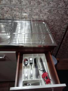 Kuchyň nebo kuchyňský kout v ubytování VALYAK rent apart hotel - Servicios Integrales + 37 fotografií