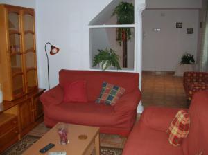 A seating area at Alojamientos Andalucia