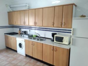 A kitchen or kitchenette at Alojamientos Andalucia