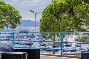 a view of a marina with boats in the water at Right by the beaches 90m2 on the Croisette in Cannes