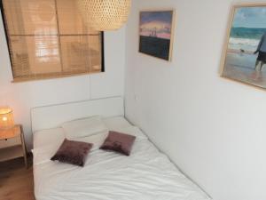 מיטה או מיטות בחדר ב-Meva Apartment Gdańsk