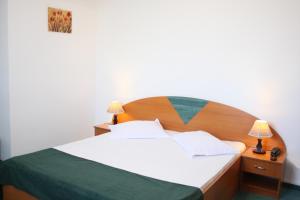 Postel nebo postele na pokoji v ubytování Hotel Sir Orhideea