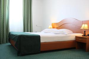 Postel nebo postele na pokoji v ubytování Hotel Sir Orhideea