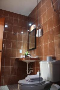 Koupelna v ubytování Hotel La Piramide Izamal