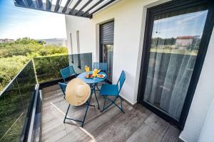 Balkón nebo terasa v ubytování CUBE Residence