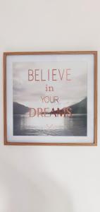 a framed picture of the words believe in your dreams at Chez Fanny - Les Tuileries - Gîte 1-4 pers. avec jardin privatif - proche Cahors in Le Montat