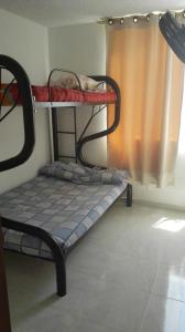 Postel nebo postele na pokoji v ubytování Apartamento vacacional en Flandes tolima