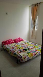 Postel nebo postele na pokoji v ubytování Apartamento vacacional en Flandes tolima