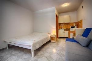 Kuchyň nebo kuchyňský kout v ubytování Apartments Dalia