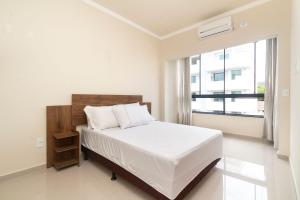 Posteľ alebo postele v izbe v ubytovaní Aluguel de Apartamento Duplex 16 para 4 pessoas em Bombas