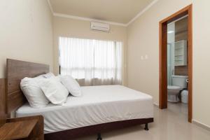 Posteľ alebo postele v izbe v ubytovaní Aluguel de Apartamento Duplex 16 para 4 pessoas em Bombas