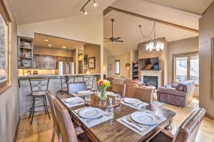 a dining room and living room with a table and chairs at Rocky Mountain Retreat 2 Mi to Beaver Creek! in Avon