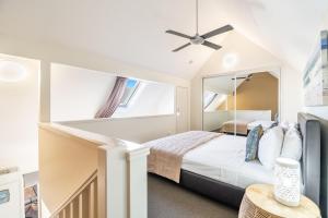 Ένα ή περισσότερα κρεβάτια σε δωμάτιο στο Byron Central Apartments
