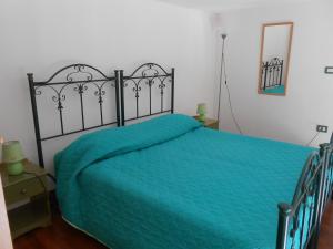 Posteľ alebo postele v izbe v ubytovaní La Piccola Masseria