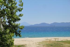 a beach with the ocean in the background at Amaryllis Studios in Asprovalta