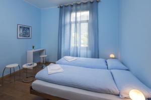 Letto o letti in una camera di Unione