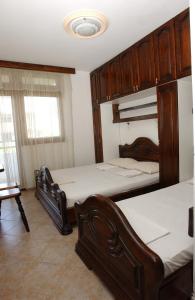 Postel nebo postele na pokoji v ubytování Rooms & Apartments Anka