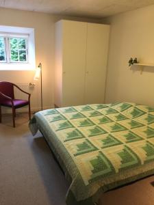Postel nebo postele na pokoji v ubytování Landlig idyl på Degnbol