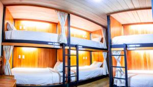 Postel nebo postele na pokoji v ubytování Nao Victoria Hostel
