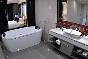 Kylpyhuone majoituspaikassa Rydges Palmerston - Darwin