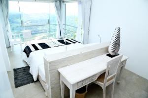 Llit o llits en una habitació de Sky Pavilion