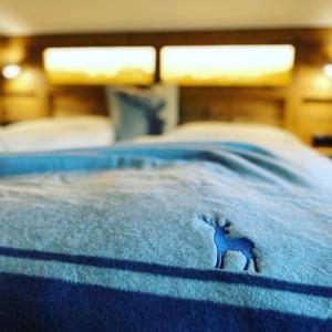 Postel nebo postele na pokoji v ubytování Tiroler Alpblick Appartements
