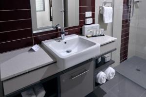 Kylpyhuone majoituspaikassa Rydges Palmerston - Darwin