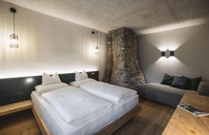 A bed or beds in a room at Autentis