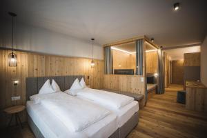 A bed or beds in a room at Autentis