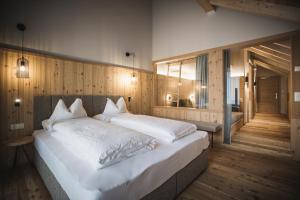 A bed or beds in a room at Autentis
