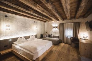 A bed or beds in a room at Autentis