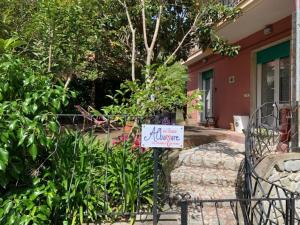 a sign on a gate in front of a house at Albamare in Monterosso al Mare
