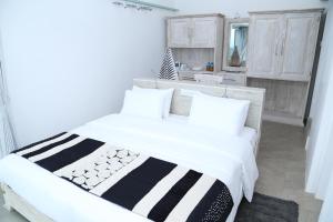 Llit o llits en una habitació de Sky Pavilion